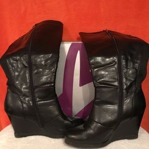 Women’s black wide calf wedge boot